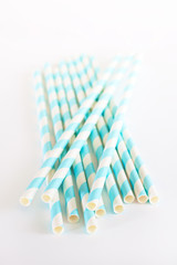 Paper drink straws on white background