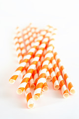 Paper drink straws on white background