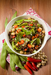 red rice with flat green beans chickpeas leek an hot chili peppe