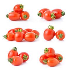 Grape or cherry tomatoes isolated on white background.
