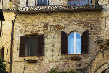 Old wall with windows in Tuscany