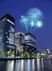 Fototapeta na wymiar Fireworks celebrating over Tokyo cityscape at nigh