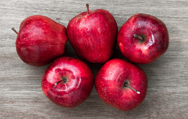 red apple on wood background