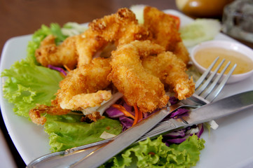 Japanese Cuisine. Fried coconut Shrimp with cocktail sauce