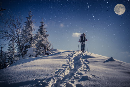 Travel In Winter Mountains At Night With Stars And A Full Moon