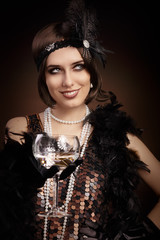 Retro 20s style woman holding champagne glass