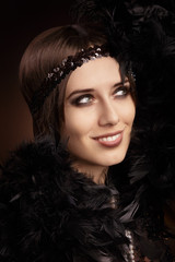 Beautiful retro woman in 20s style party outfit