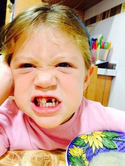 Mischievous gap-toothed girl