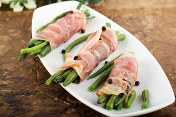 Roulade of bacon and beans