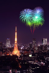 Fototapeta premium Fireworks celebrating over Tokyo cityscape at night