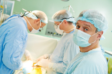 surgeons team at cardiac surgery operation