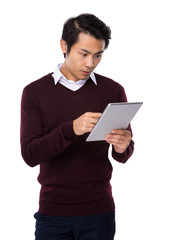 Asian man use tablet