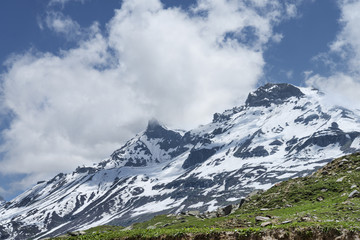 Fototapeta premium Clouded snow peaks