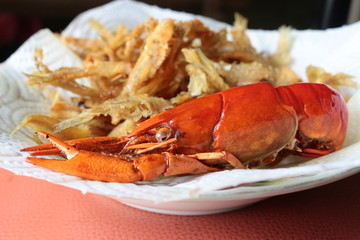 close-up macro boiled crawfish or crayfish  and fish fried of lo