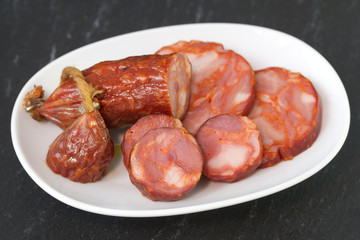 sausage on white dish