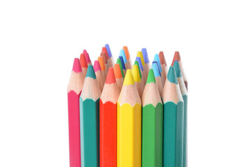 Assortment of colored pencils over white