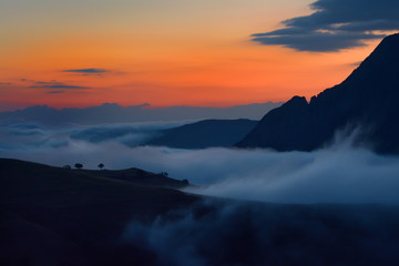 Fototapeta na wymiar beautiful mountain landscape in foggy morning in Alba, Romania