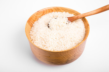 Fototapeta na wymiar White Rice in Wood Bowl on White Counter