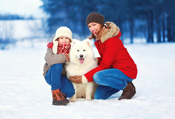 Christmas, winter and people concept - beautiful happy family