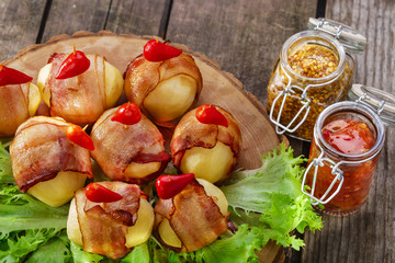 potatoes wrapped in bacon and baked