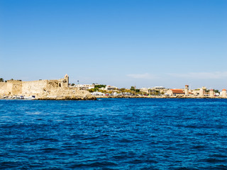 Fototapeta na wymiar View from the sea to the fortress of Rhodes.