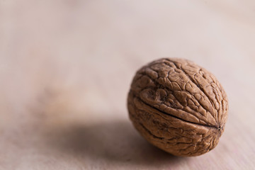 whole walnut on a wooden board