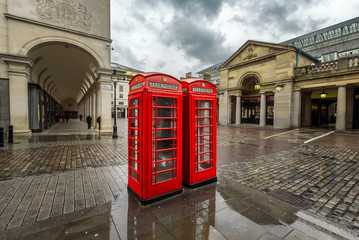 Red Telephone Box at Covent Garden Market on Rainy Day, London,