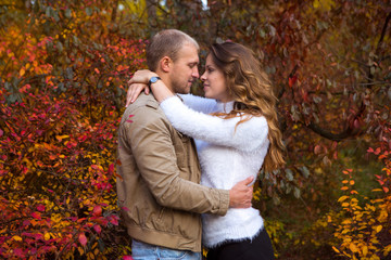 Fototapeta premium Couple walking in autumn Park