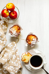 Obraz na płótnie Canvas Breakfast table with cakes, coffee and fruits
