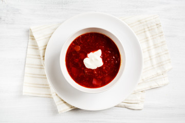 Russian soup borsch on white table