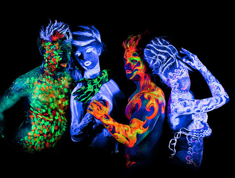 Four - Body art glowing in ultraviolet light