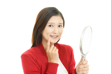 歯の痛みを訴える女性