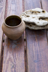 Clay pot on a wooden table