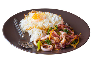 SEAFOOD SPICY STIR-FRY with fried egg and rice