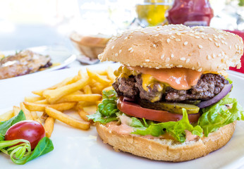 American cheese burger with Golden French fries