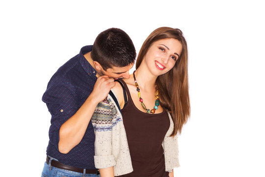 Boy Kissing Girlfriend's Shoulder