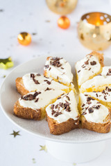 Pandoro slice with cream filling and chocolate chips