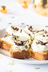 Pandoro slice with cream filling and chocolate chips