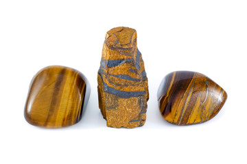Tiger's eye rough and tumbled close up white background