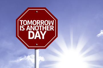 Tomorrow is Another Day written on red road sign