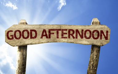 Good Afternoon wooden sign on a beautiful day