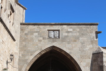 Fototapeta na wymiar arms above the arched entrance