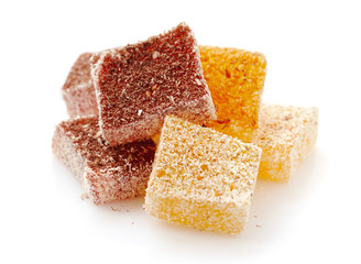 Sweet pieces of turkish delight on white background