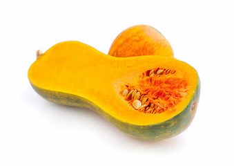 Cut orange Pumpkin on white background