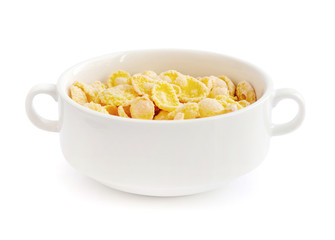 Cornflakes in bowl on white background