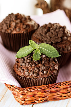 Homemade chocolate muffins in paper cupcake holder