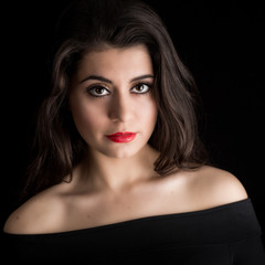 Fototapeta premium Portrait of a Beautiful Young Brunette Woman Lookng in the Camer