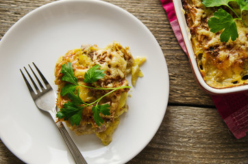 baked potato with meat and cheese on plate