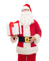 man in costume of santa claus with gift box