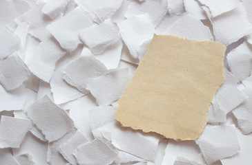 background of rough torn crumpled paper with gray and white